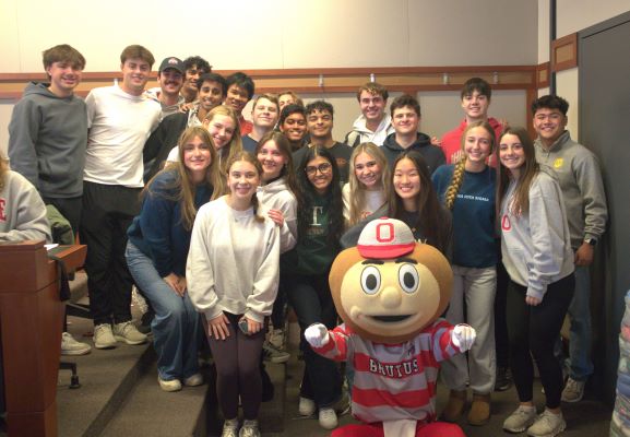 group of students posing with Brutus Buckeye
