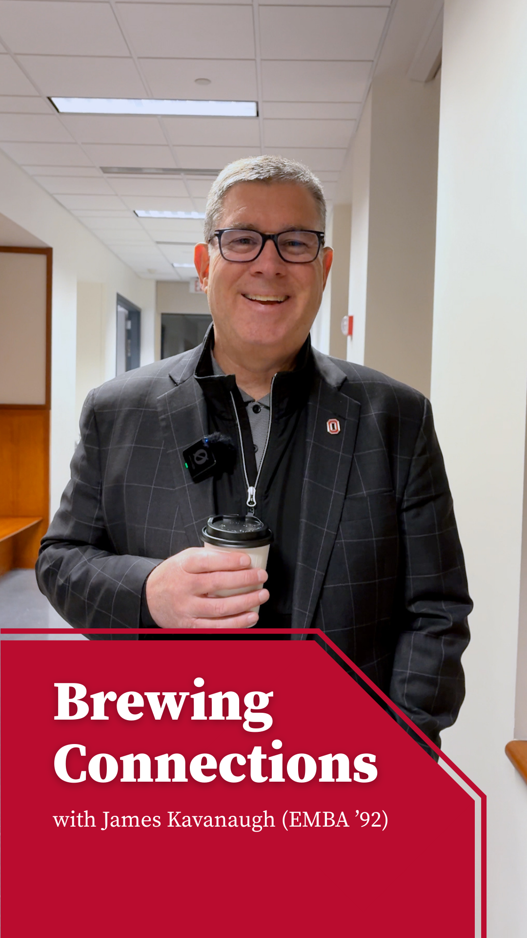 James Kavanaugh holding a coffee cup