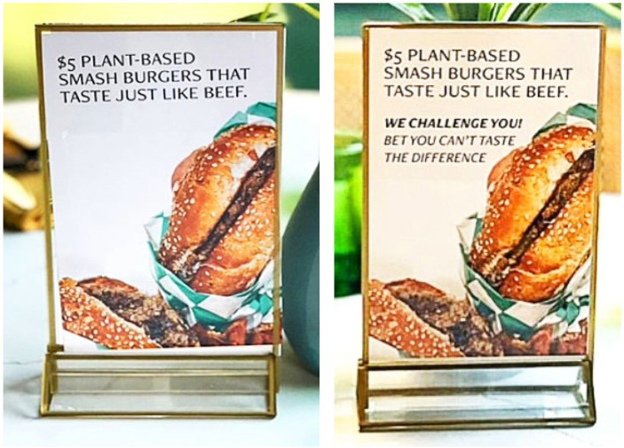 Two table-top signs placed side by side. One reads $5 plant-based smash burgers that taste just like beef. The second signs reads, $5 plant-based smash burgers that tast just like beef. We challenge you! Bet you can't taste the difference.