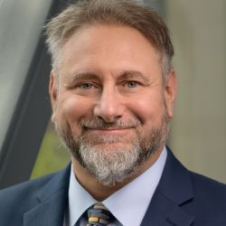 headshot of Richard Makadok