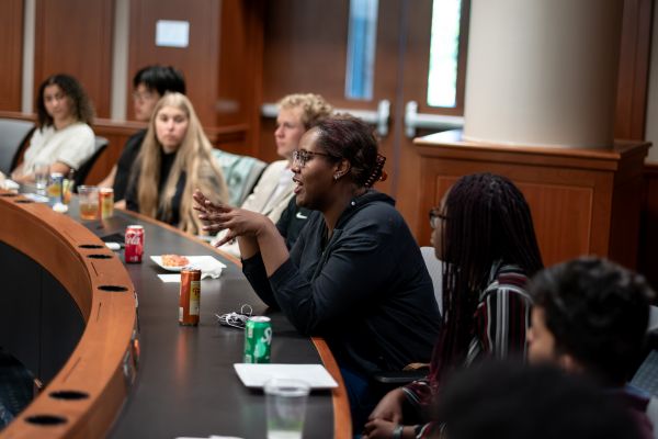 Row of students seated in the lecture hall.