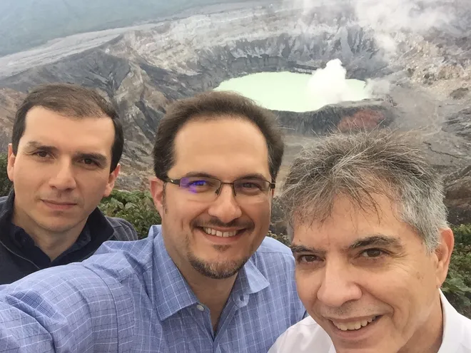 Dr. Daniel Prevedello (middle) and Dr. Ricardo Carrau (right) pose for a photo in Costa Rica with a colleague.