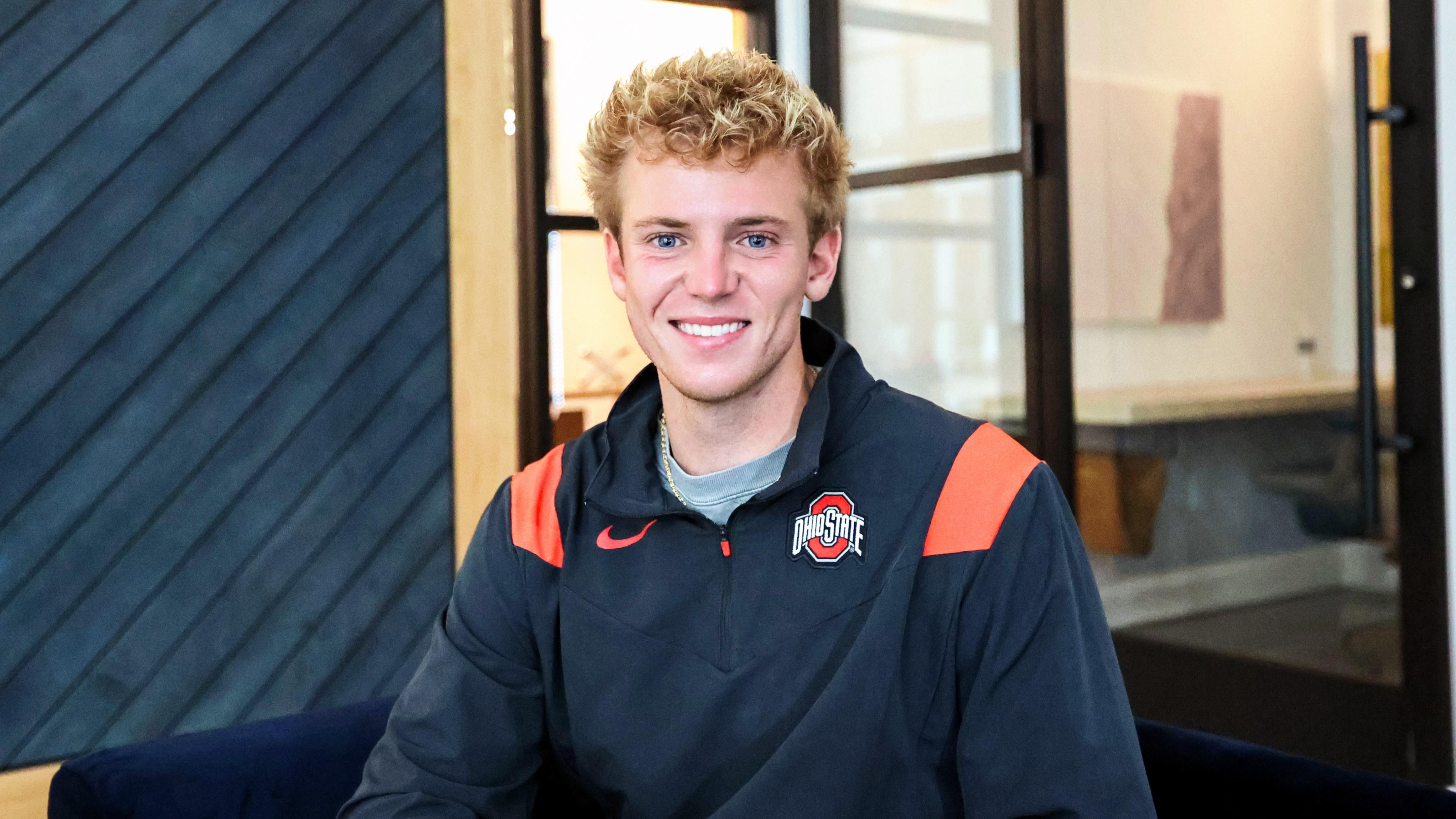 Nicolas Meader (BSBA '23) poses for a photo in his Ohio State jacket.