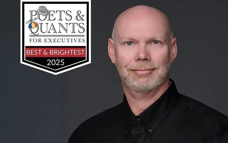 Headshot of Christopher Judd with Poets&Quants logo on left side