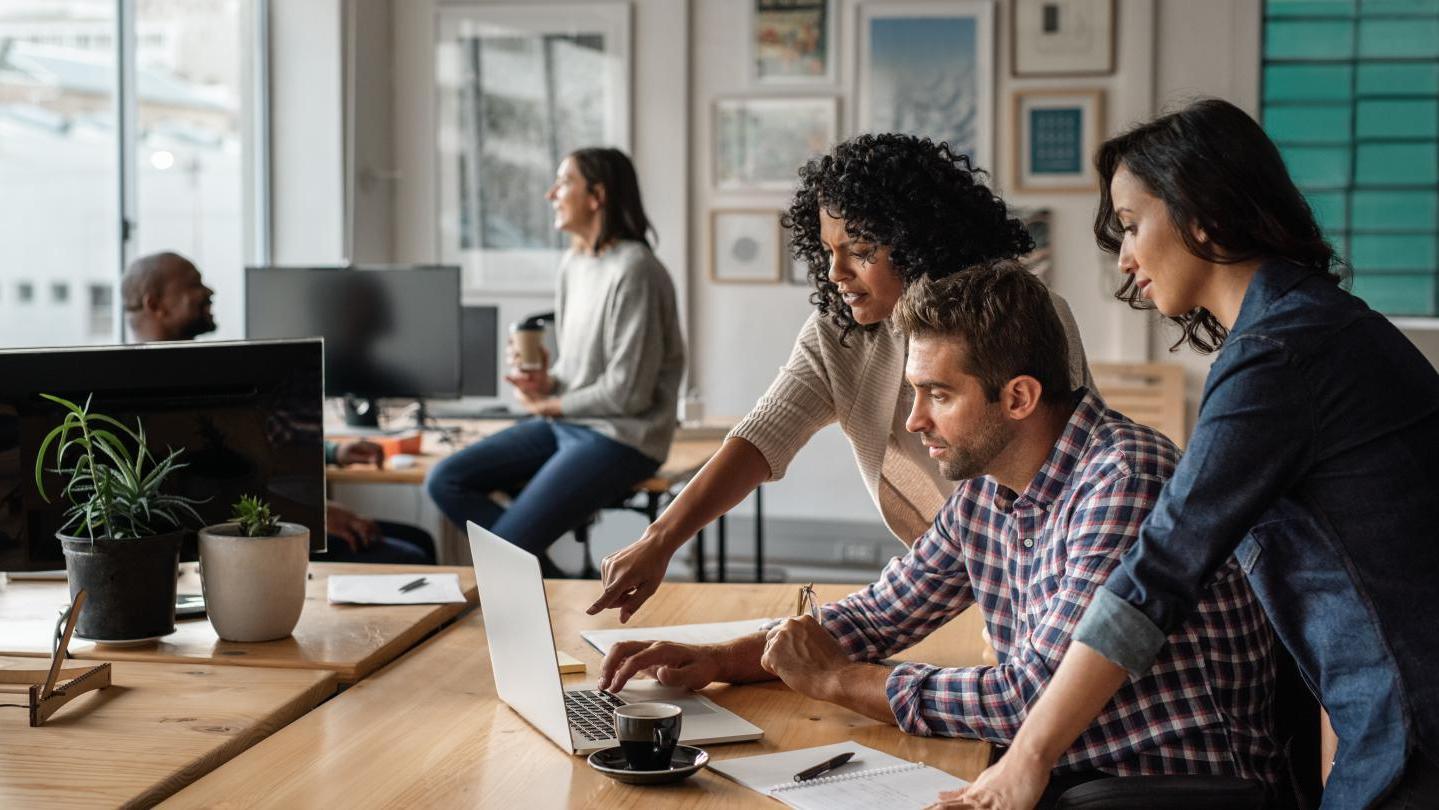 People working and talking in an office
