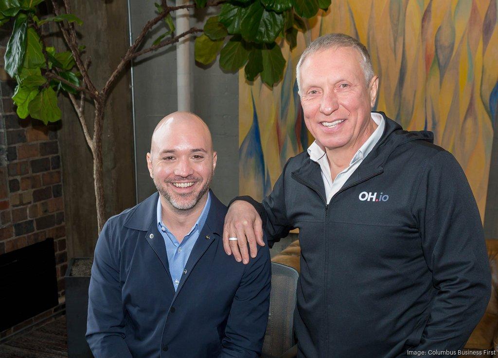 Jeff Schuman smiles alongside Ratmir Timashev.