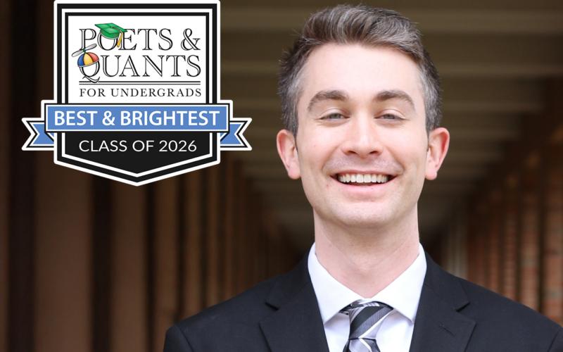 Caleb Woodell smiles in a hallway at Fisher with the Poets&Quants logo in the top left corner