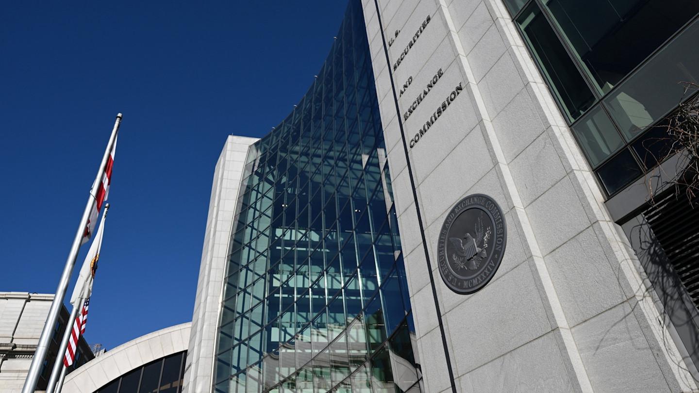The U.S. Securities and Exchange Commission building against a blue sky.