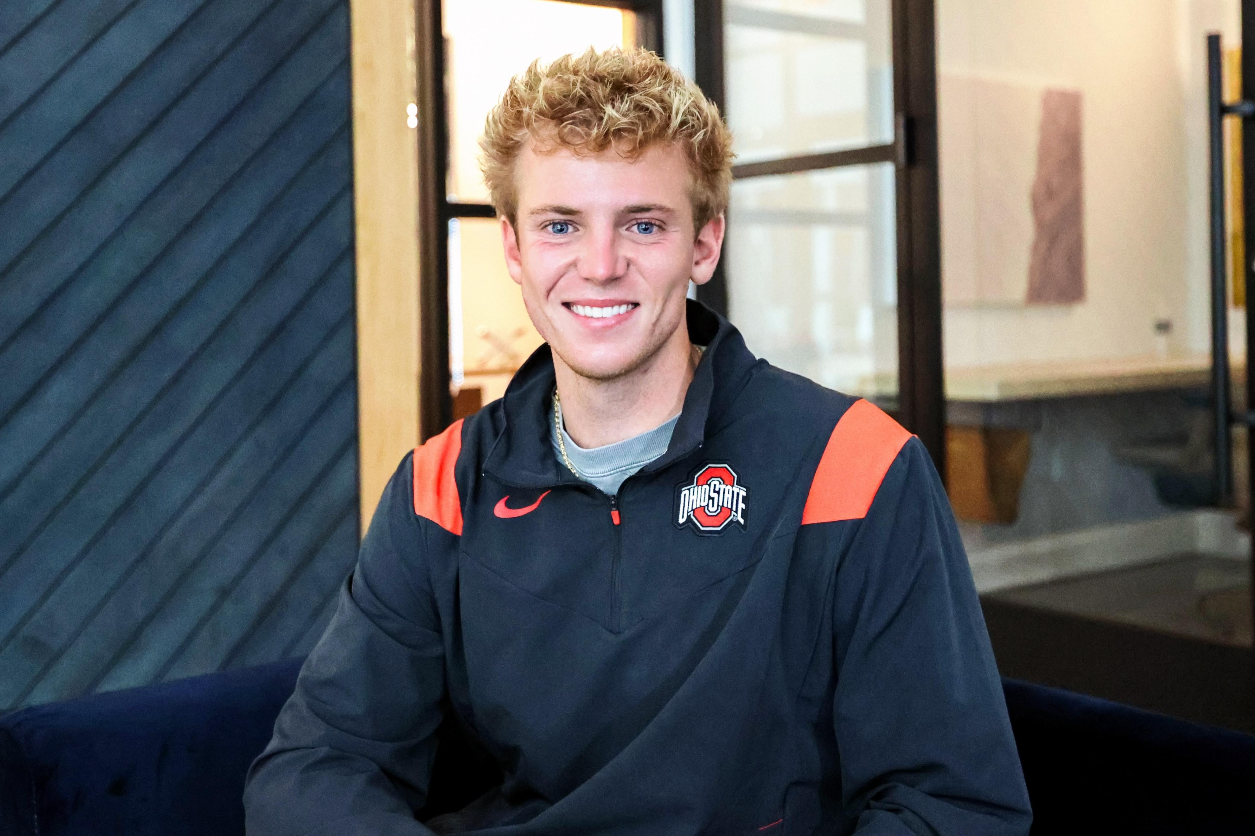 Nicolas Meader (BSBA '23) poses for a photo in his Ohio State jacket.
