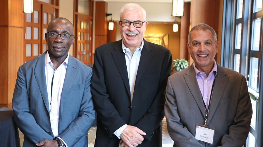 Rene Stulz with former students and current Georgetown University professors, Rohan Williamson, and Lee Pinkowitz.