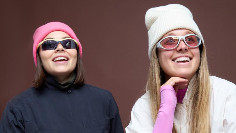 Madison Hilson and Valentina Thompson are pictured left to right wearing knit caps and sunglasses.