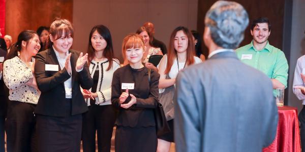 Group of alumnae applaud Dean Makhija