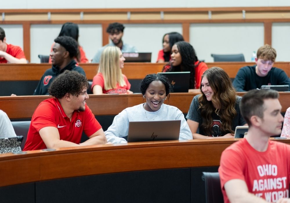 Undergraduate students collaborating in a classroom