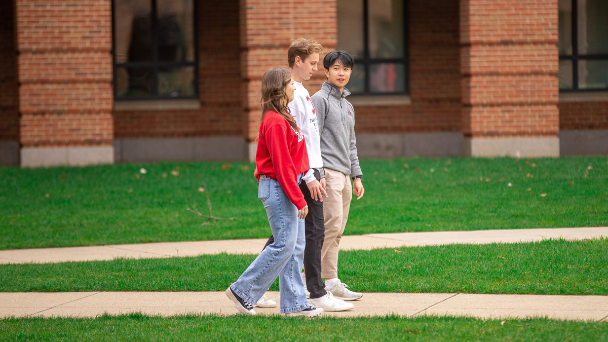 People walking around campus.