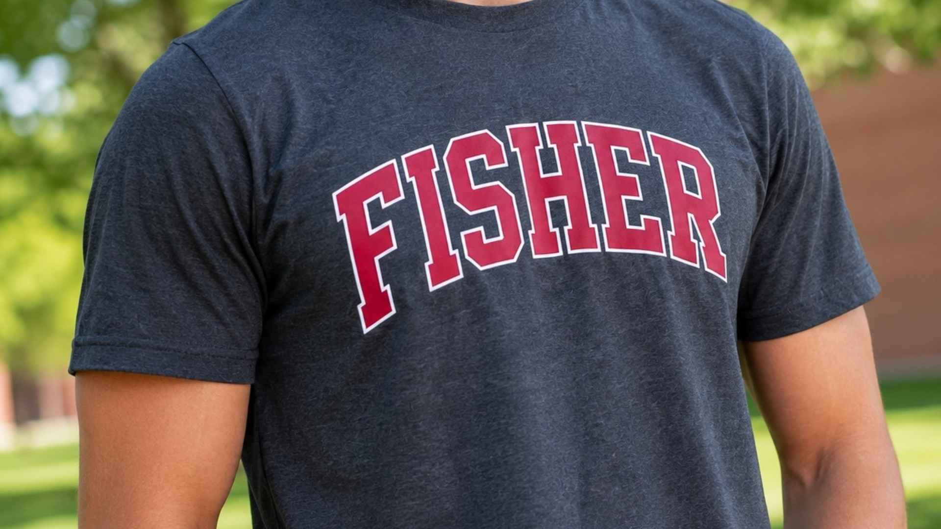 Close-up of a student wearing a T-shirt that says Fisher