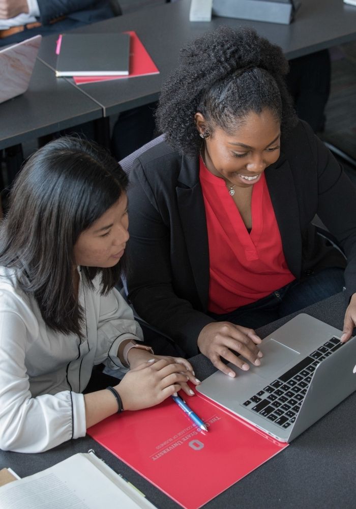 two students working together at a computer