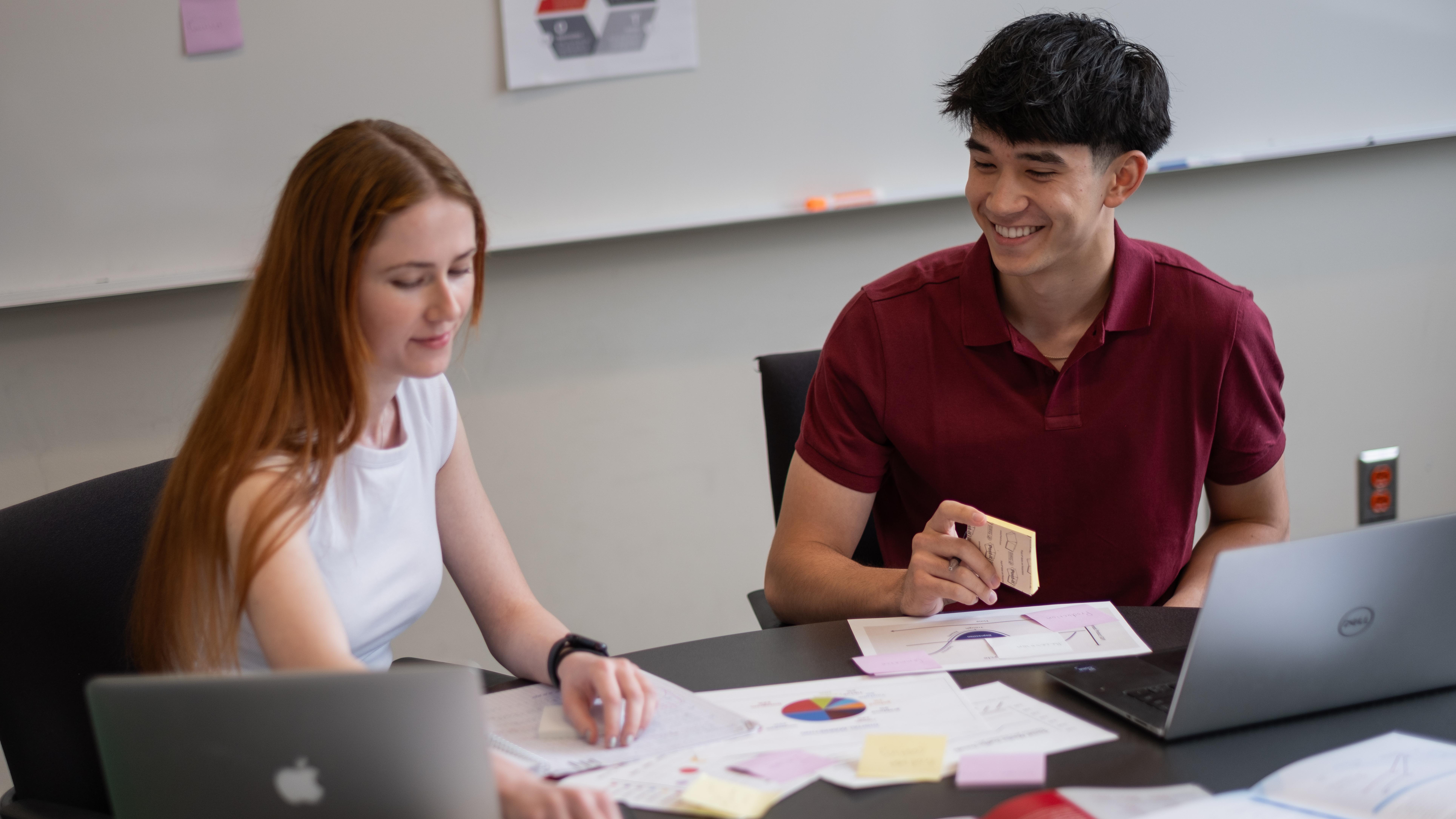 two students working at a table