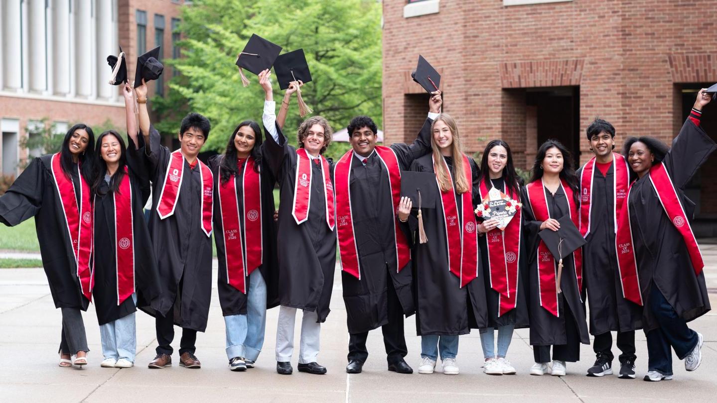 Students in graduation gowns.