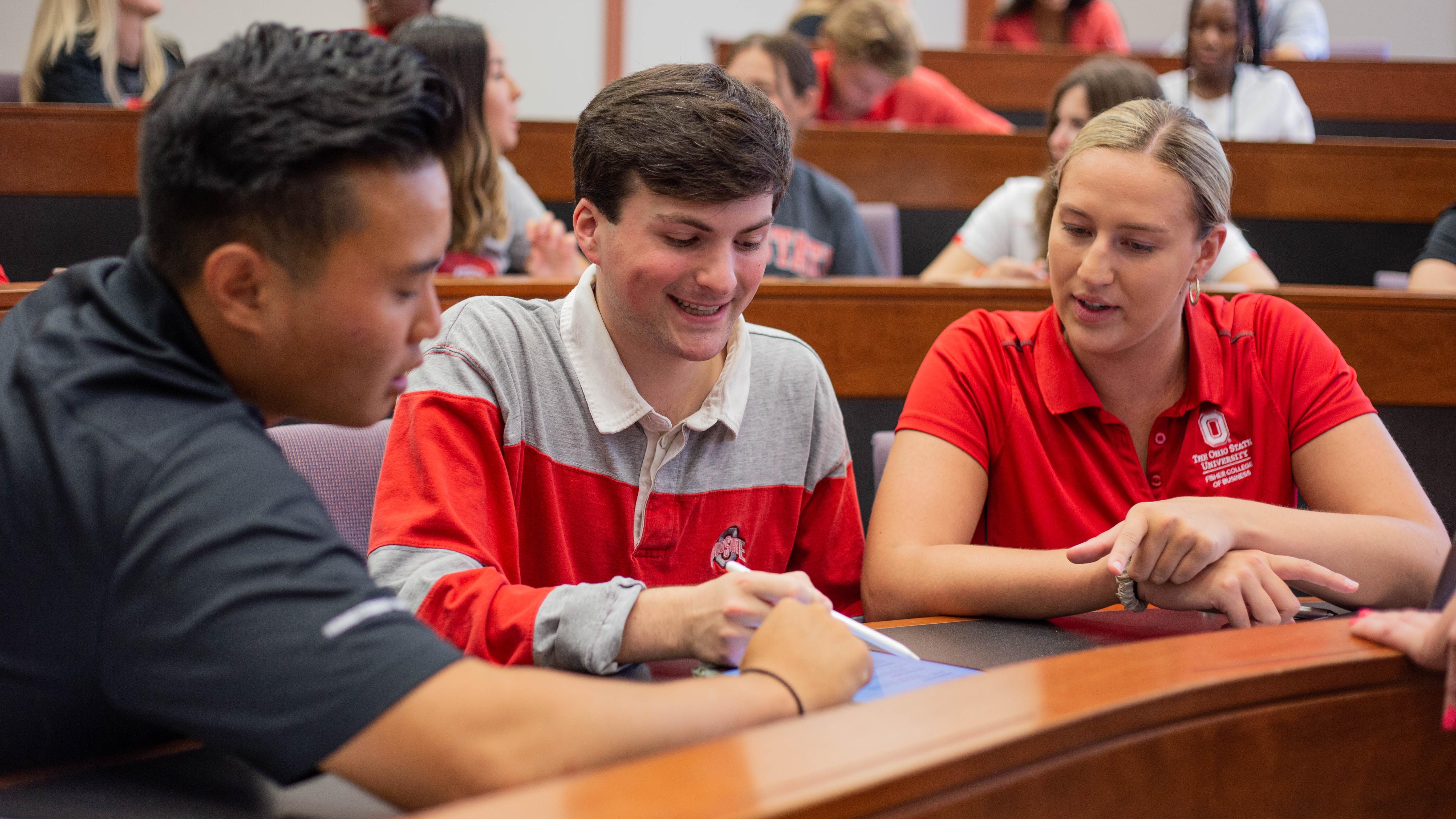 students working together at a desk