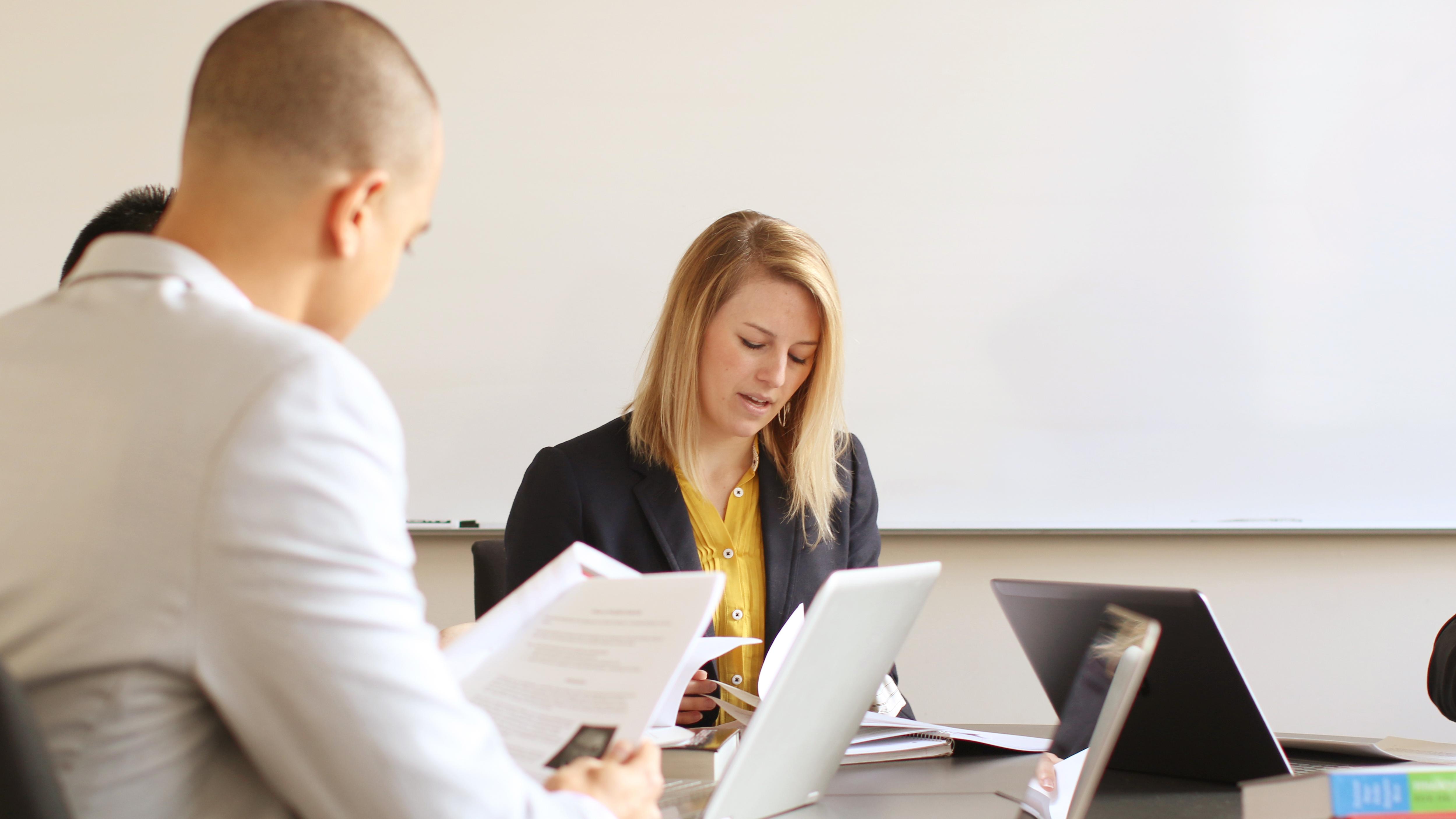 students collaborating at a table