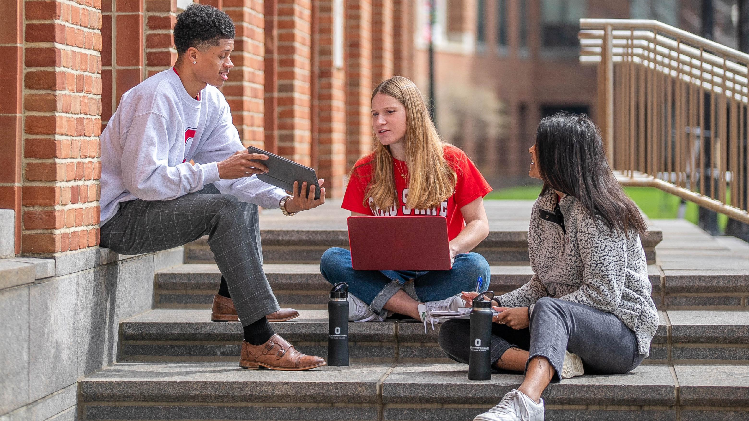 students working together on Fisher's campus