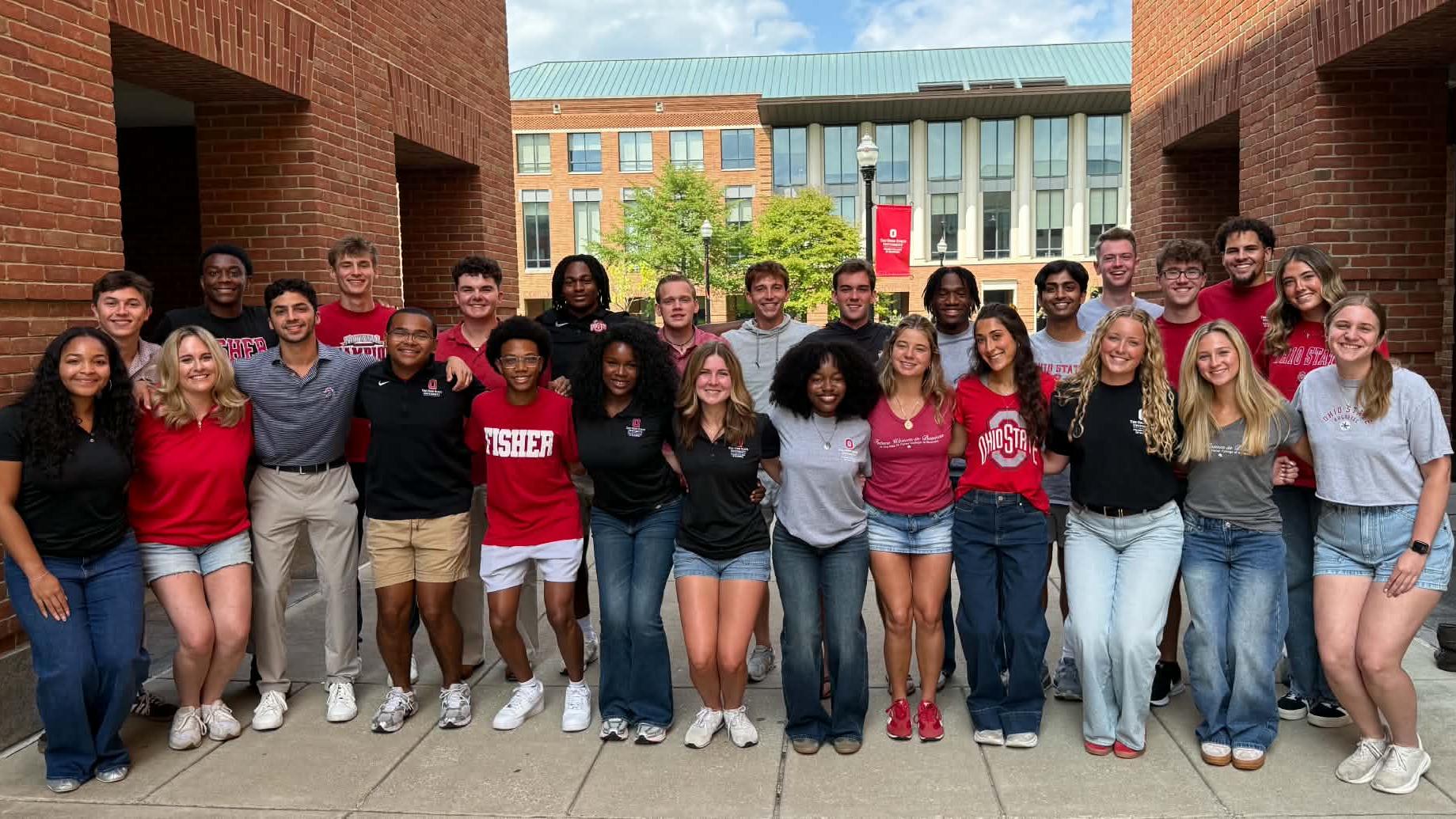 Group of Fisher ambassadors posing for a pic in the Fisher courtyard