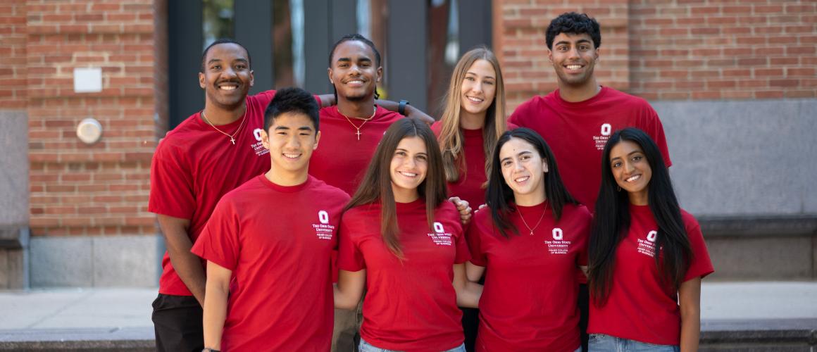 Group of Fisher students posing together on the stairs