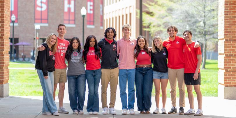 Fisher students posing for a group photo on Fisher's campus