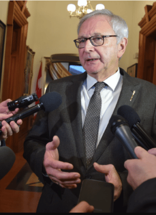 Le premier ministre Blaine Higgs répond aux questions de journalistes à Frédéricton, le 13 décembre 2022. — Photo : Alexandre Boudreau - Acadie Nouvelle