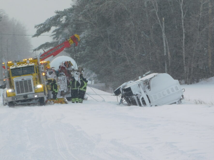 A heavy snowfall and an unplowed backcountry road add up to misfortune for the driver of heating oil truck trying to make a delivery in Alfred-Plantagenet Township in the middle of the day February 25. The driver tried to pull his truck over to let a small car get by and ended up toppling into the ditch because he could not tell where the snow-covered road ended and the edge of the ditch began. The driver was unhurt but it required two heavy-duty tow trucks to pull his rig out of the ditch and back onto the road. — Photo Gregg Chamberlain