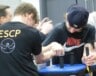 Muscles straining with their efforts, young arm-wrestlers strive to pin their opponents’ hands to the table in the first Prescott-Russell Secondary School Athletics Association Eastern Regionals Arm-Wrestling Championships in Hawkesbury March 24.  — photo Gregg Chamberlain