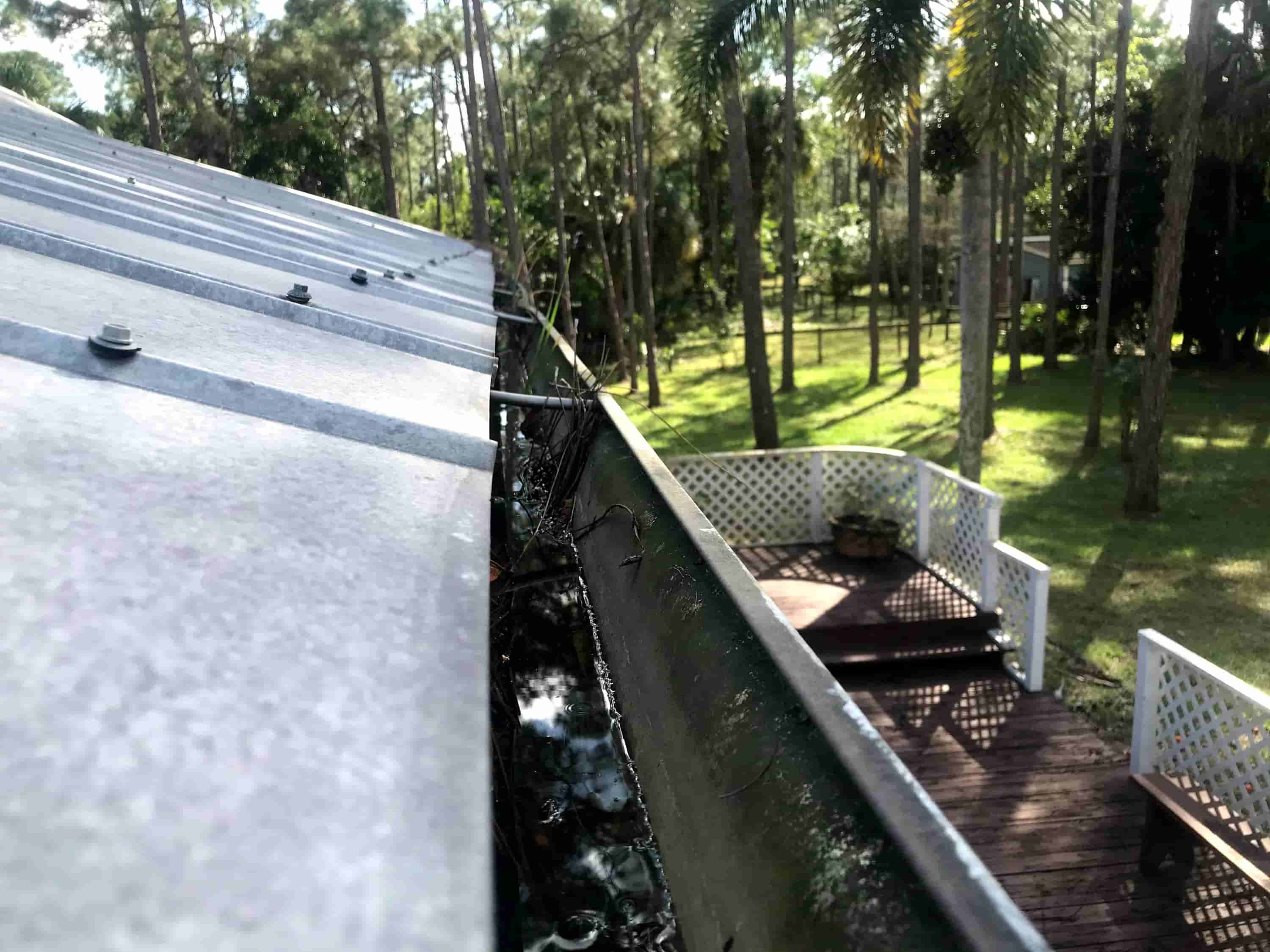 cleaning high gutters without ladder