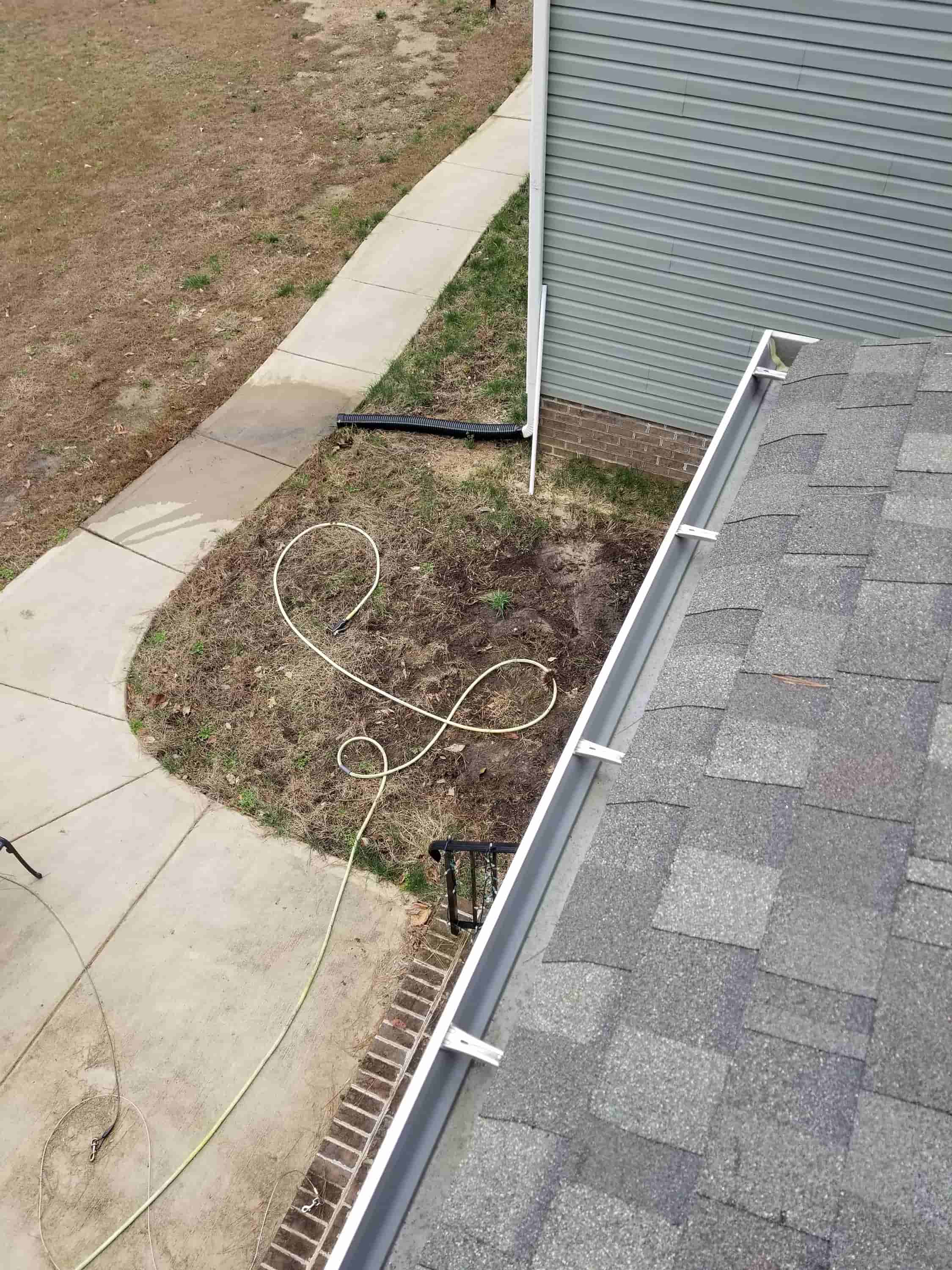 clean gutters with gutter guards