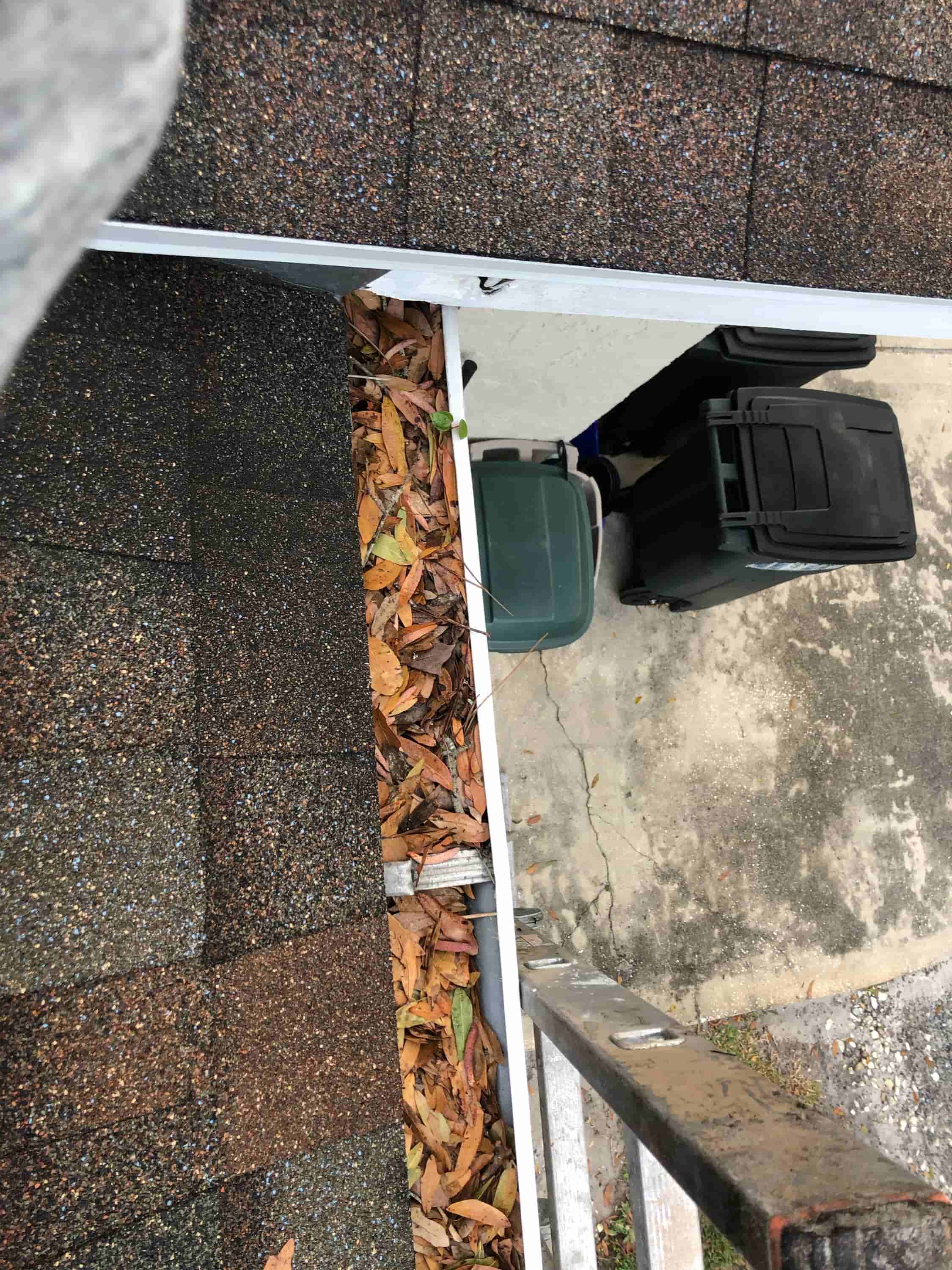 cleaning downspouts