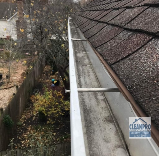 cleaning gutters two story house