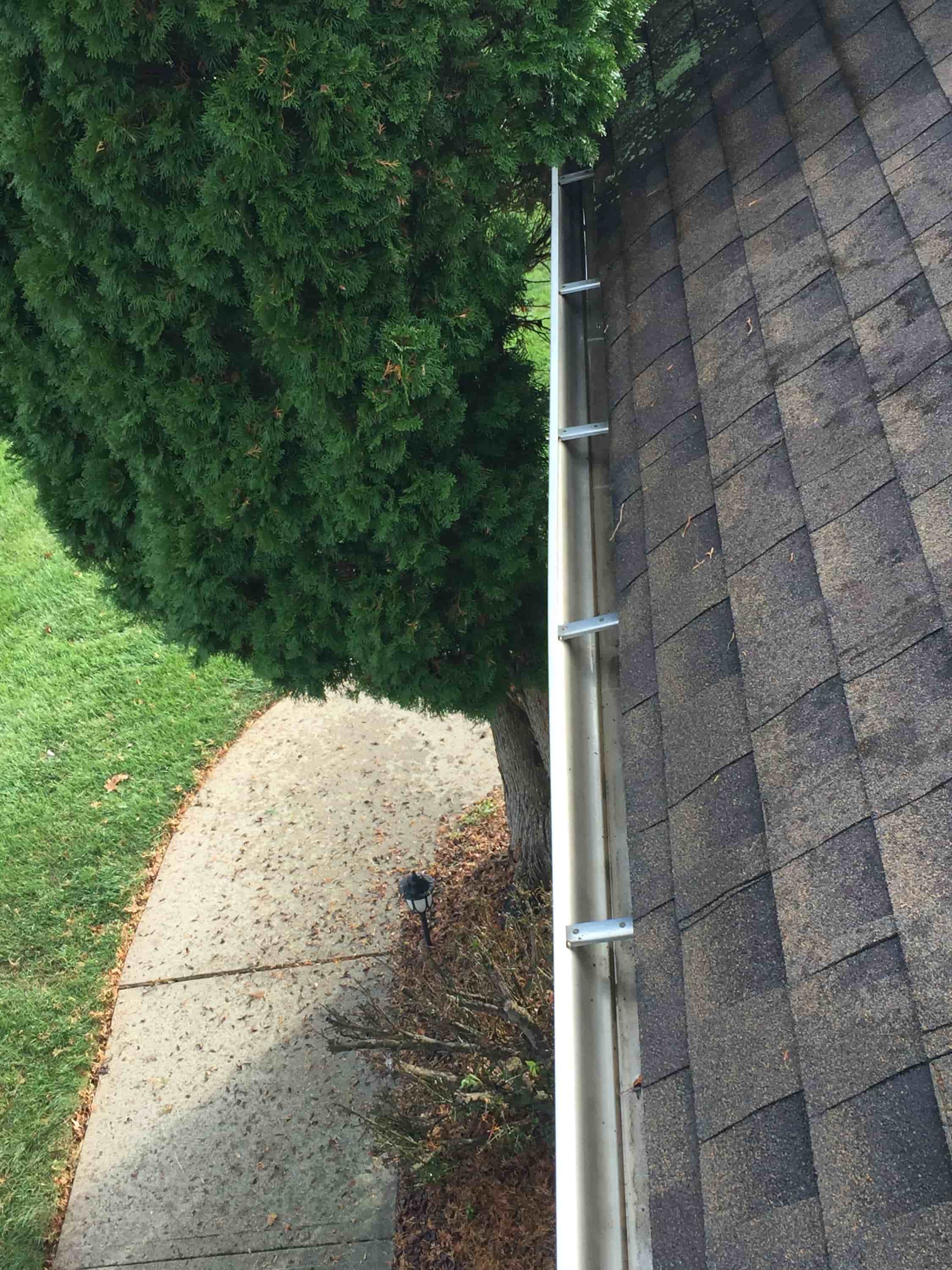 how to clean gutters and downspouts