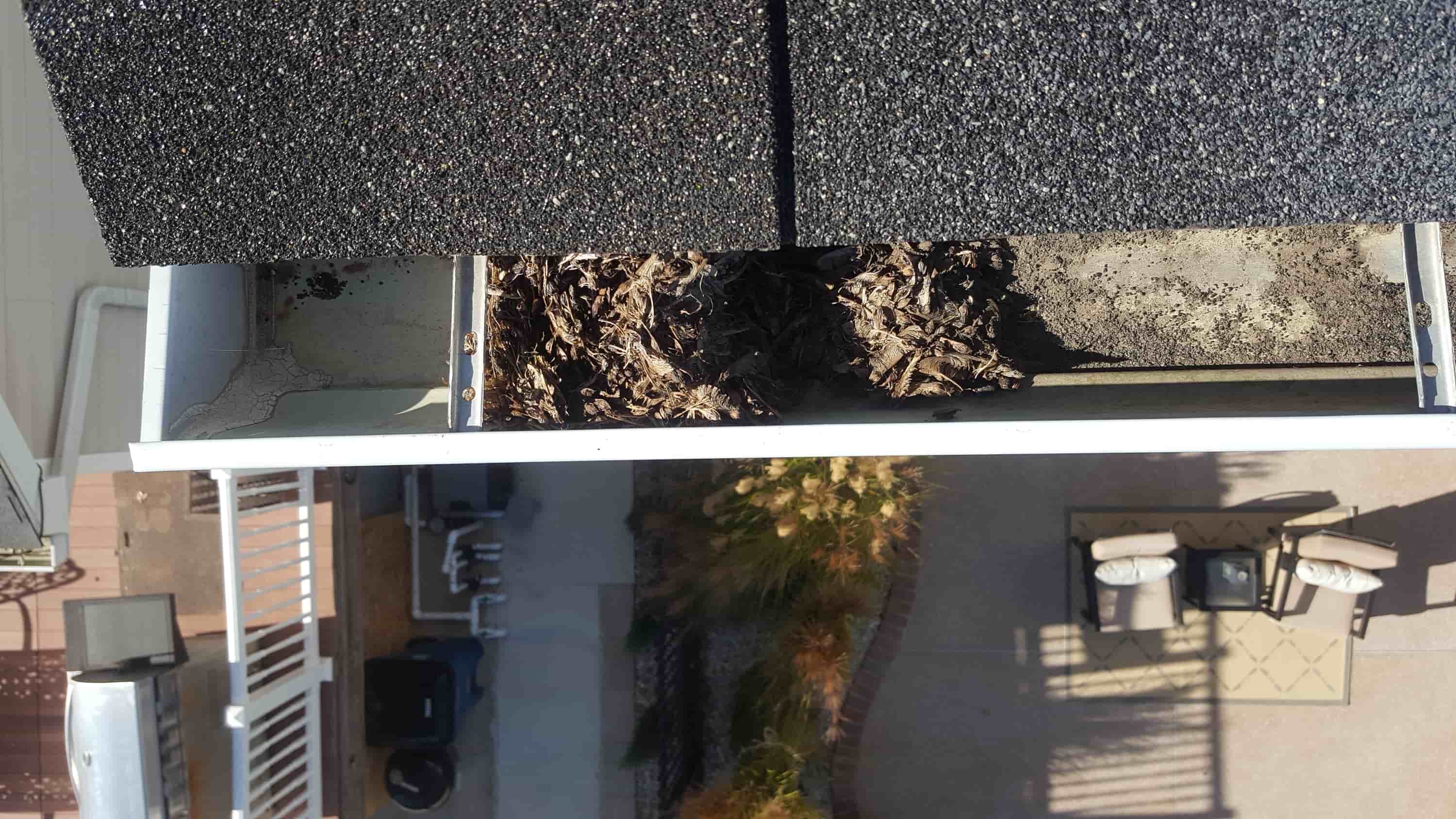 cleaning white aluminum gutters
