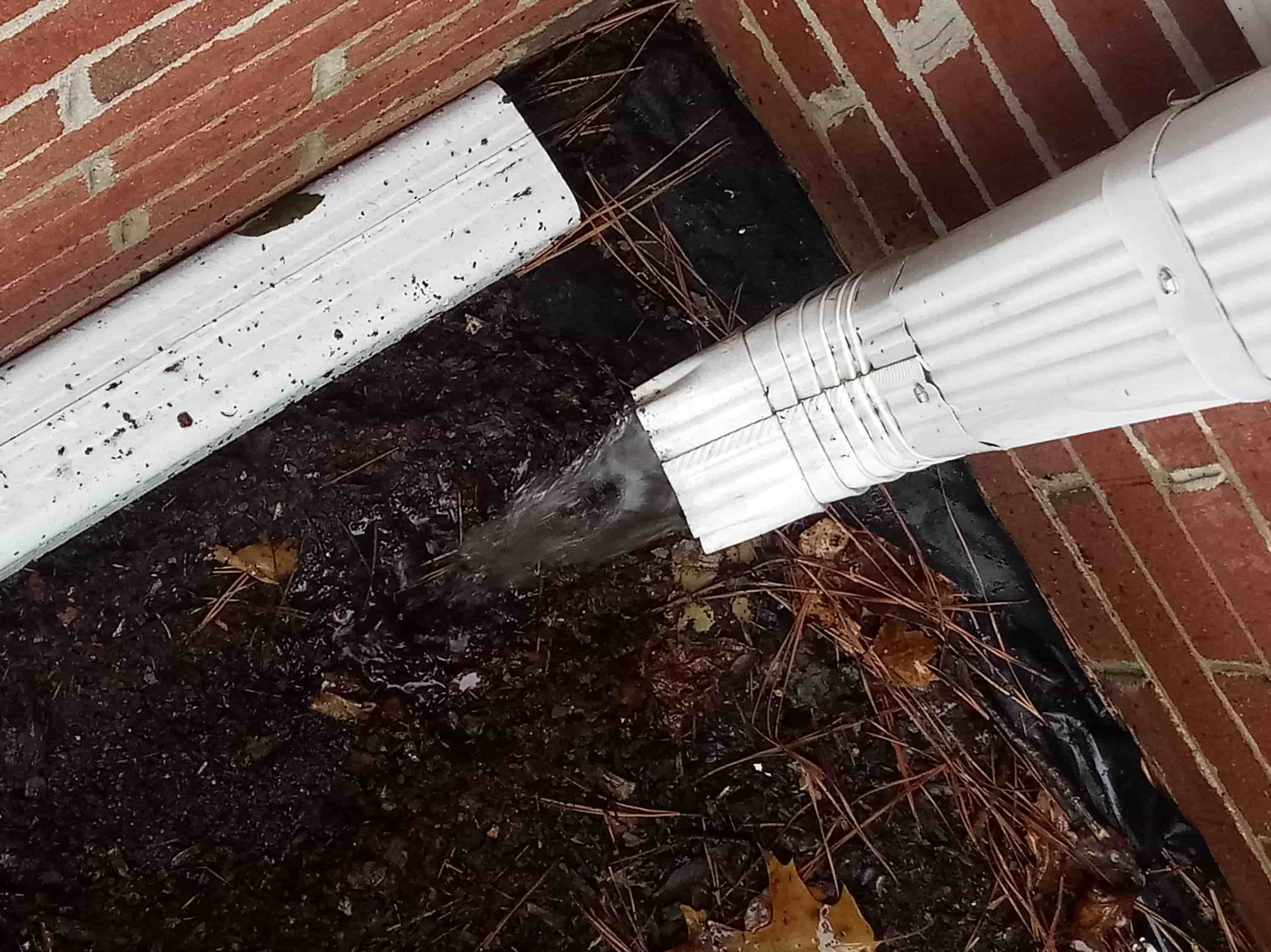 cleaning a gutter