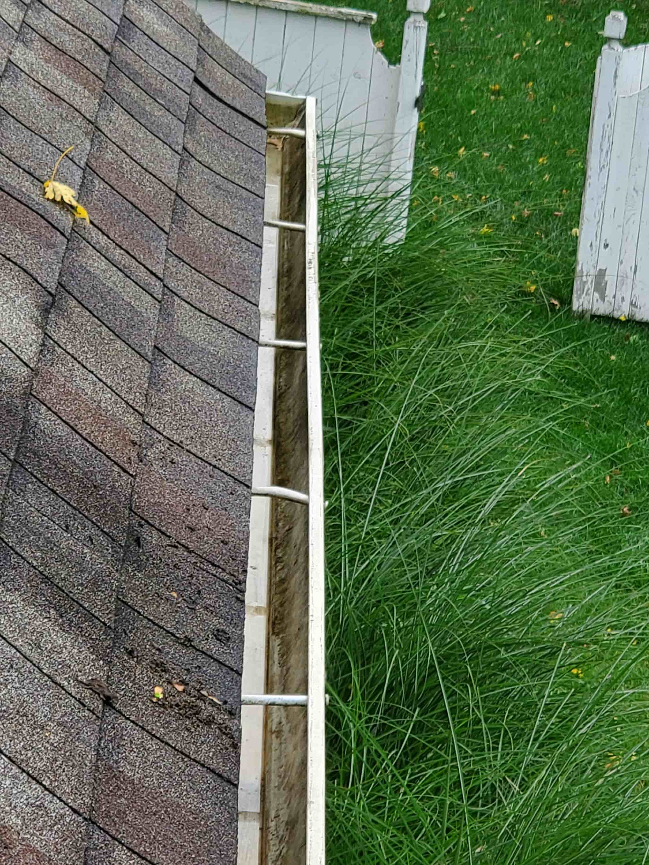 how to clean clogged gutters