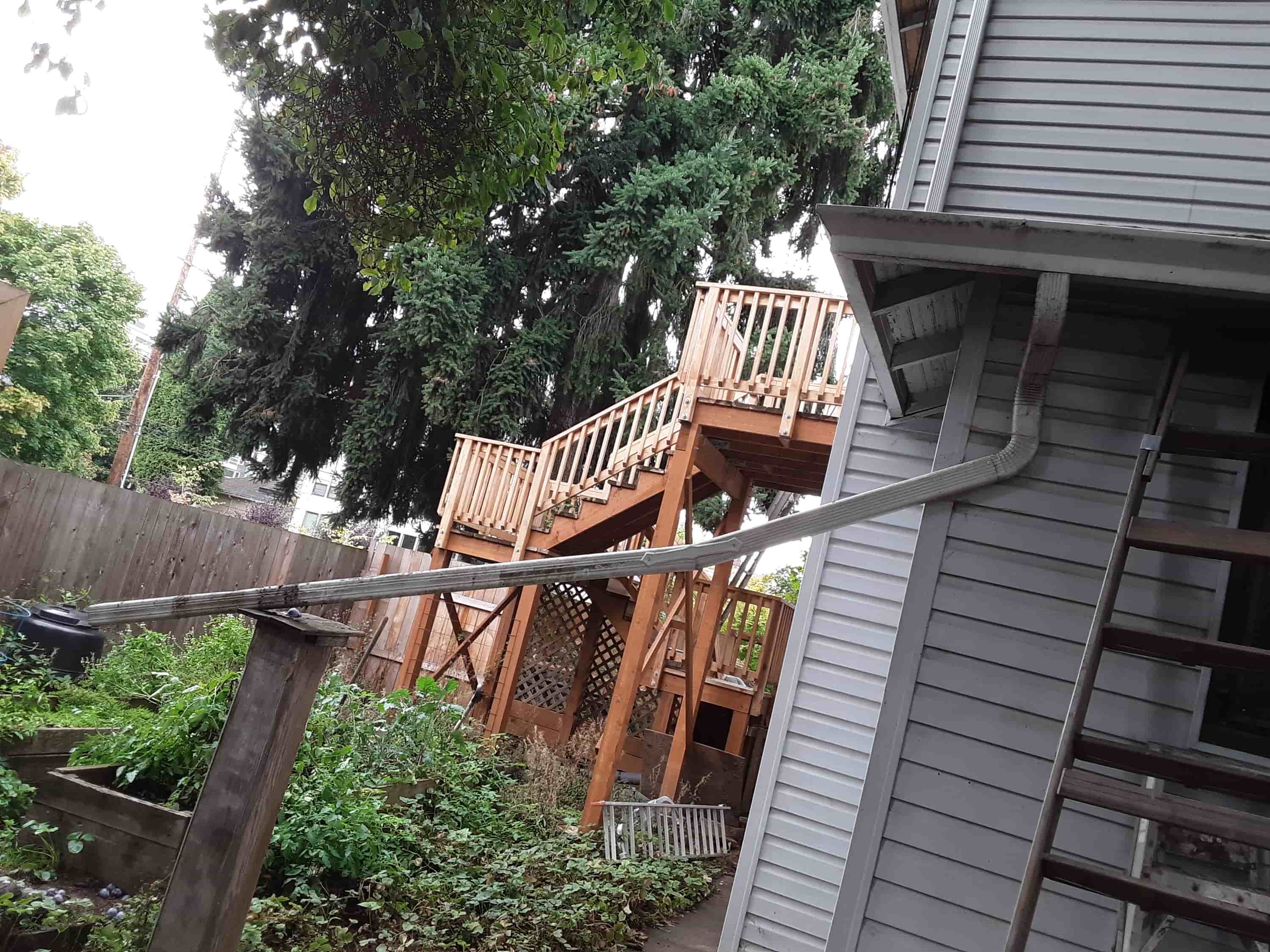 how to clean eavestroughs without a ladder