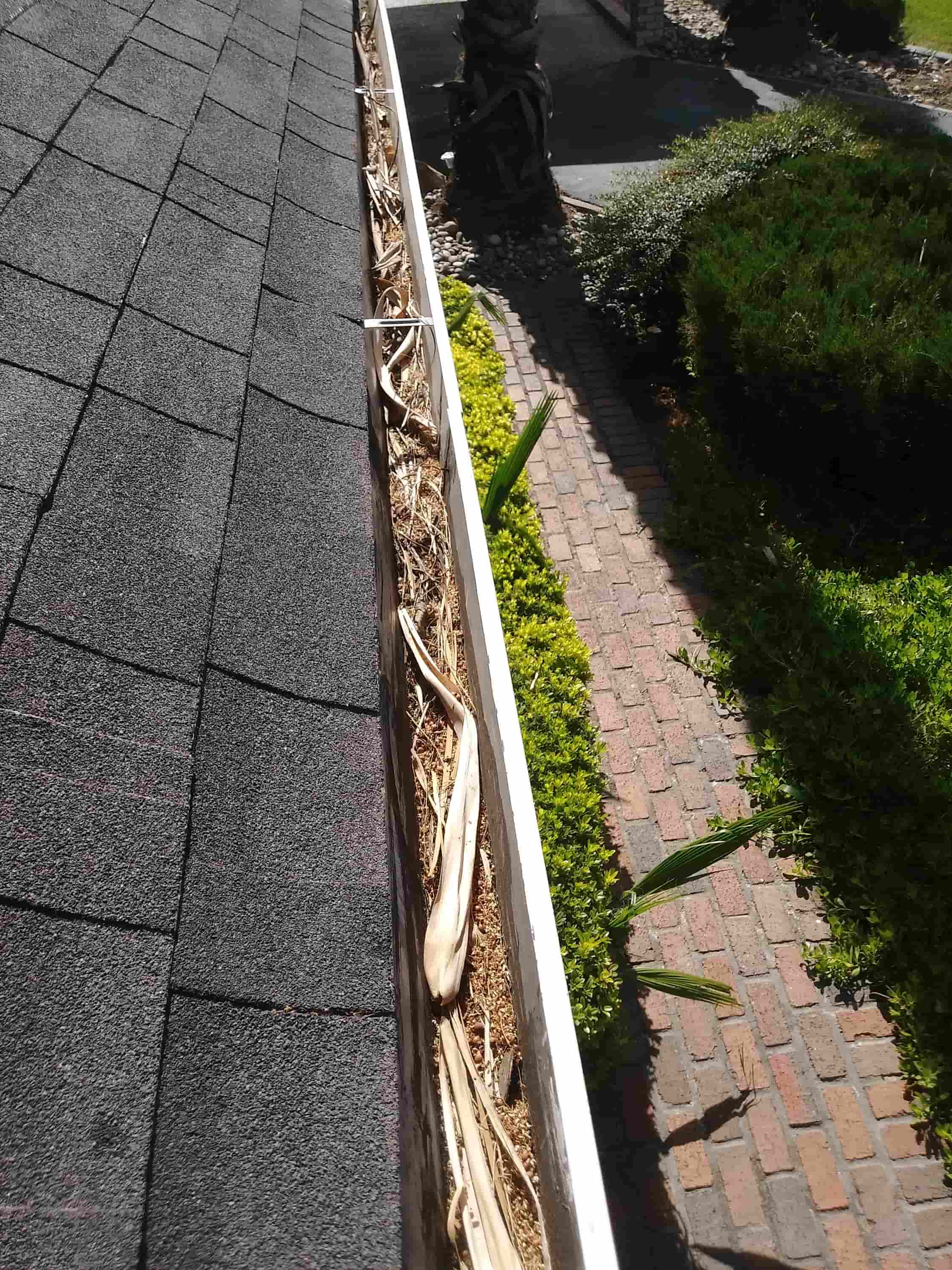 unclogging gutters
