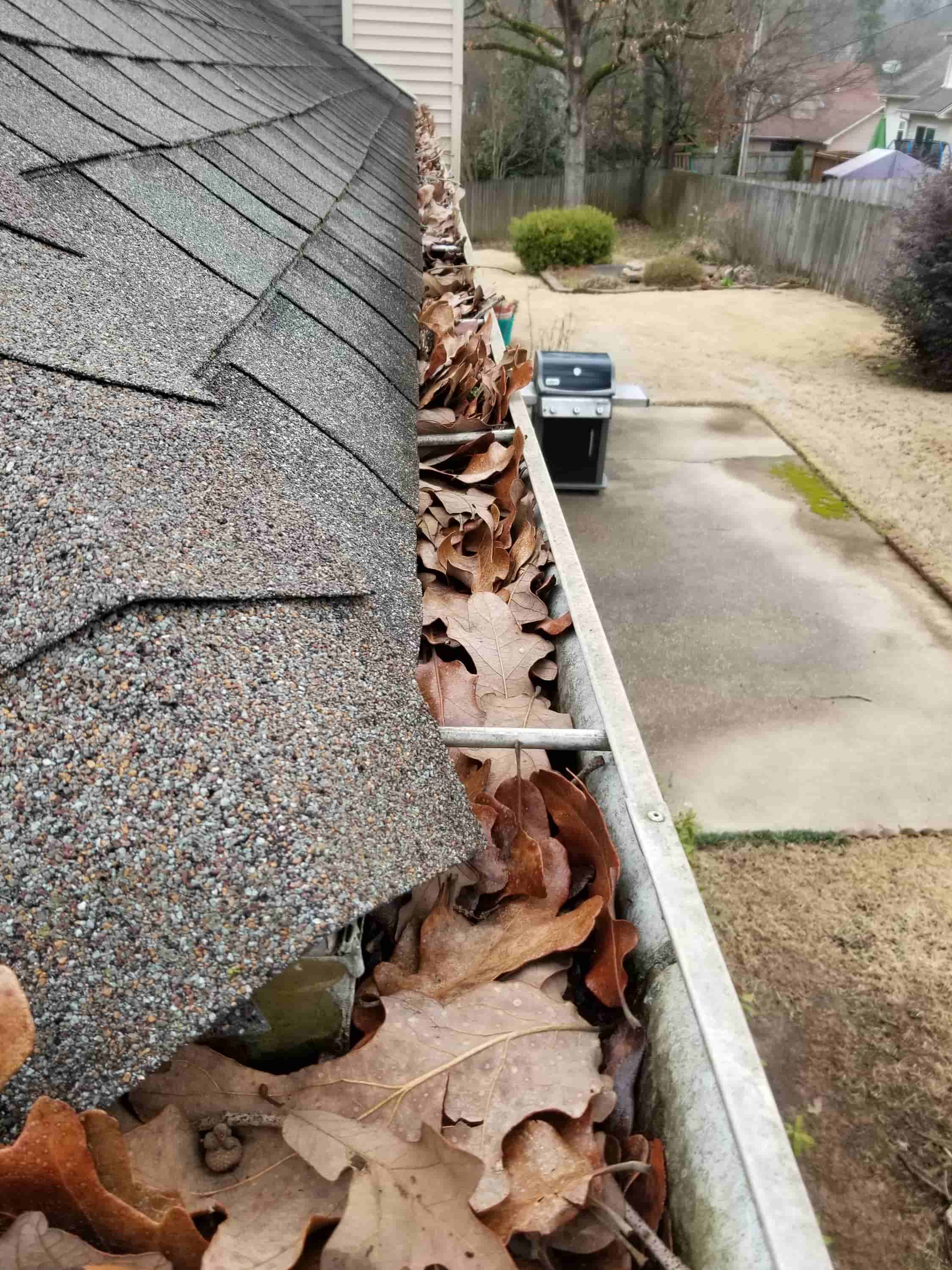 roof gutter cleaning cost