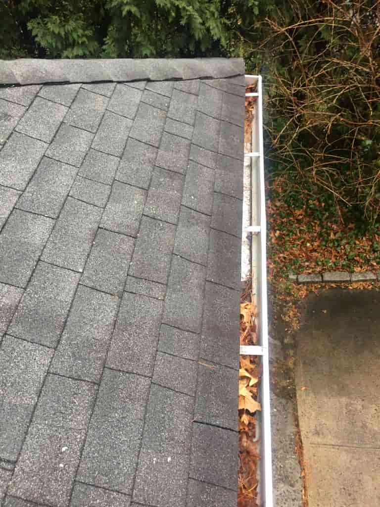 cleaning gutters from the roof