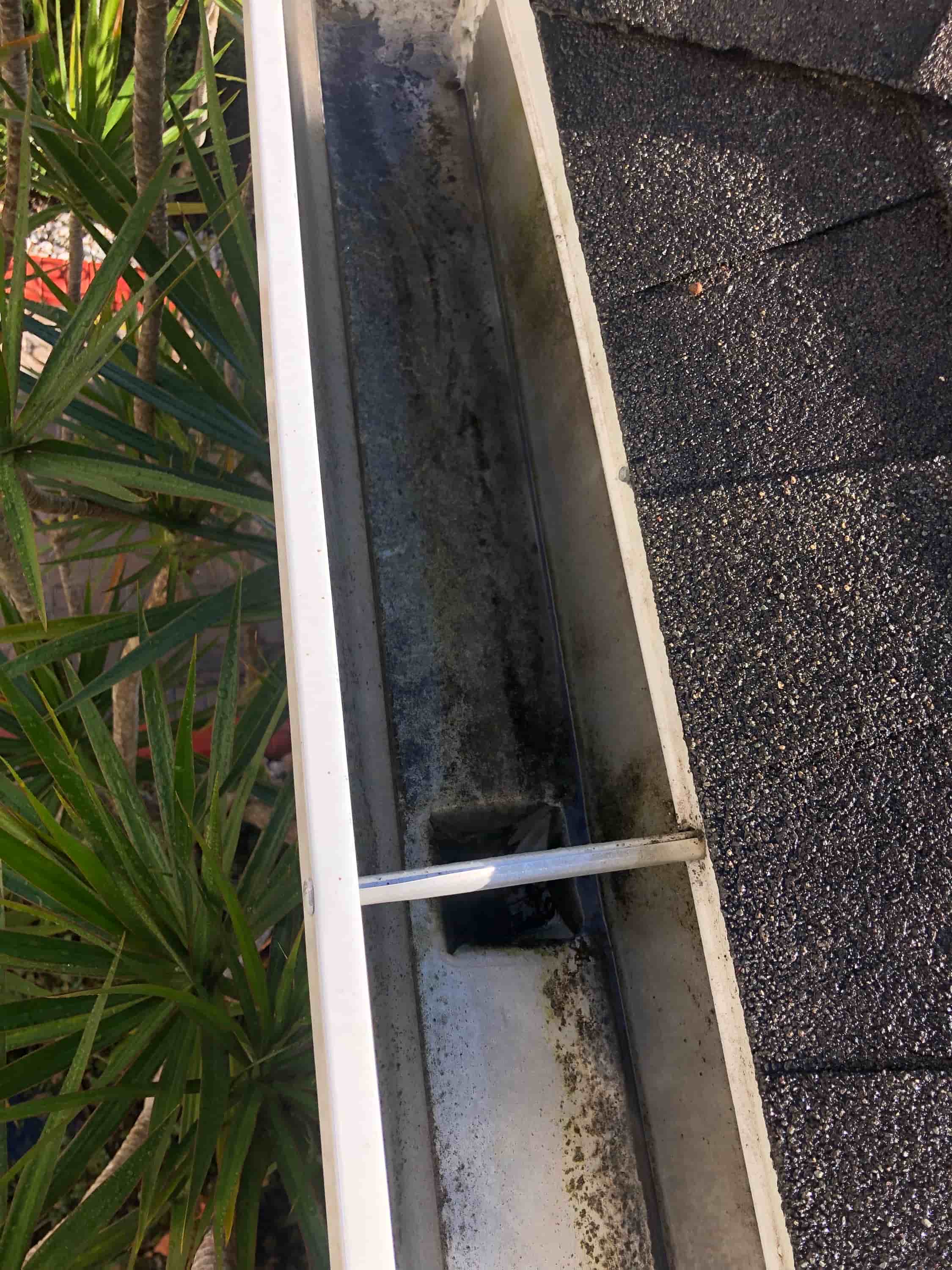 ladder attachment for cleaning gutters