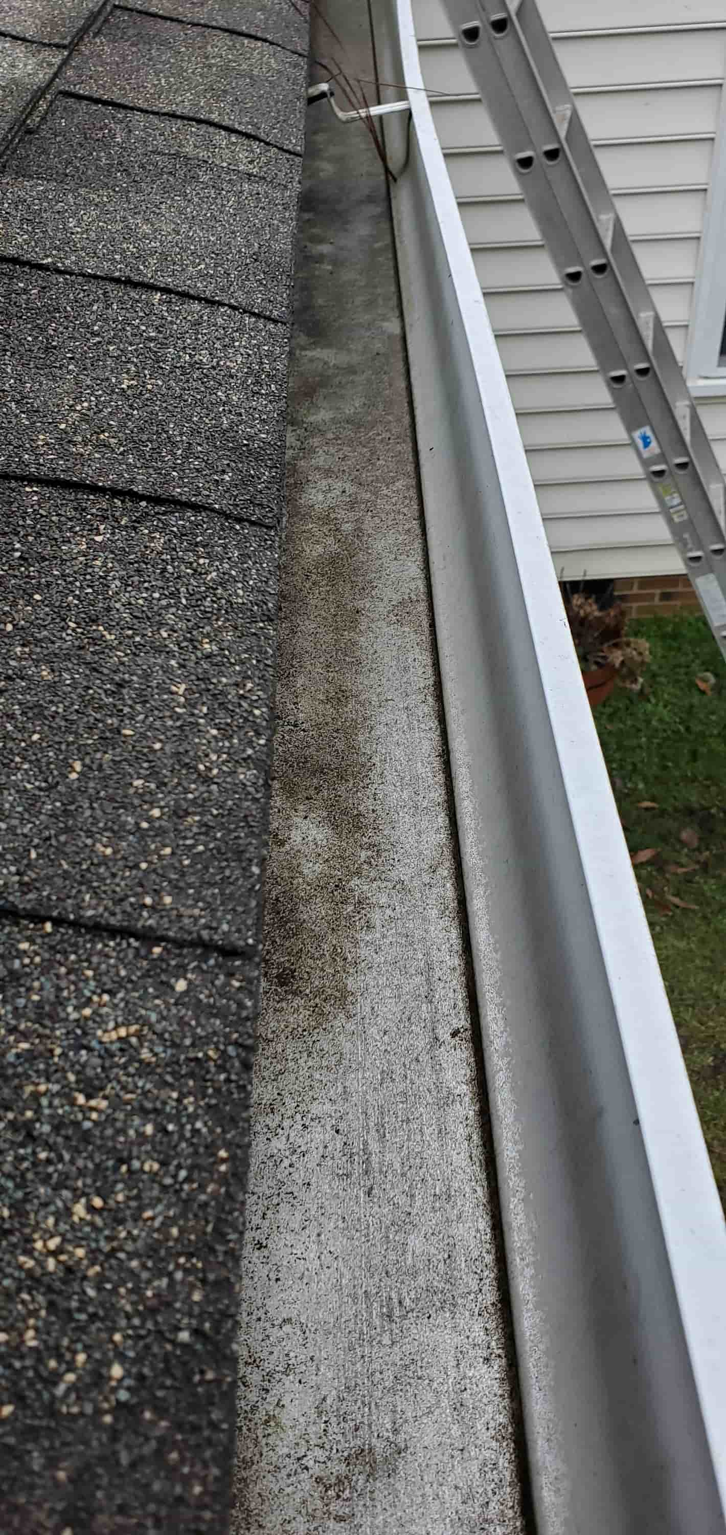 gutter cleaning with pressure washer