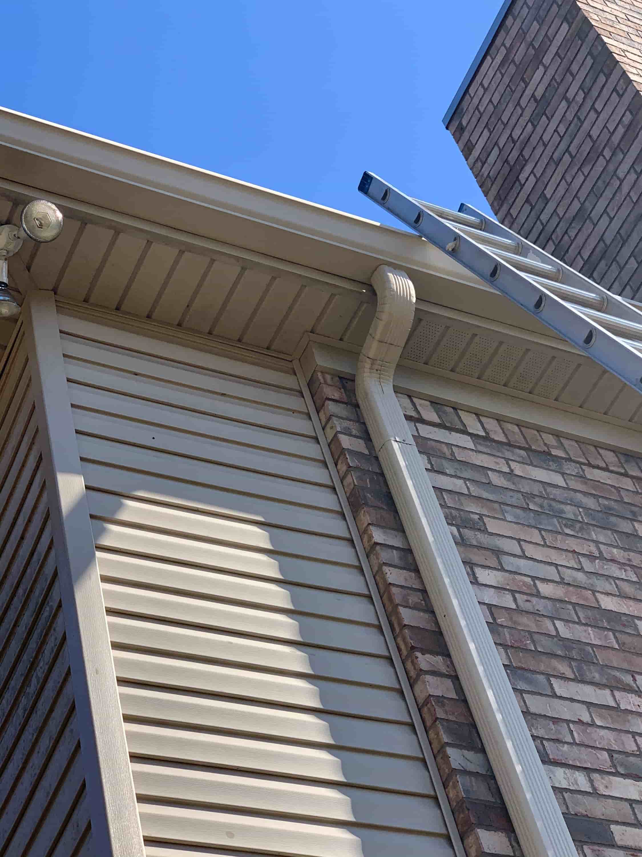 how to clean gutters with guards