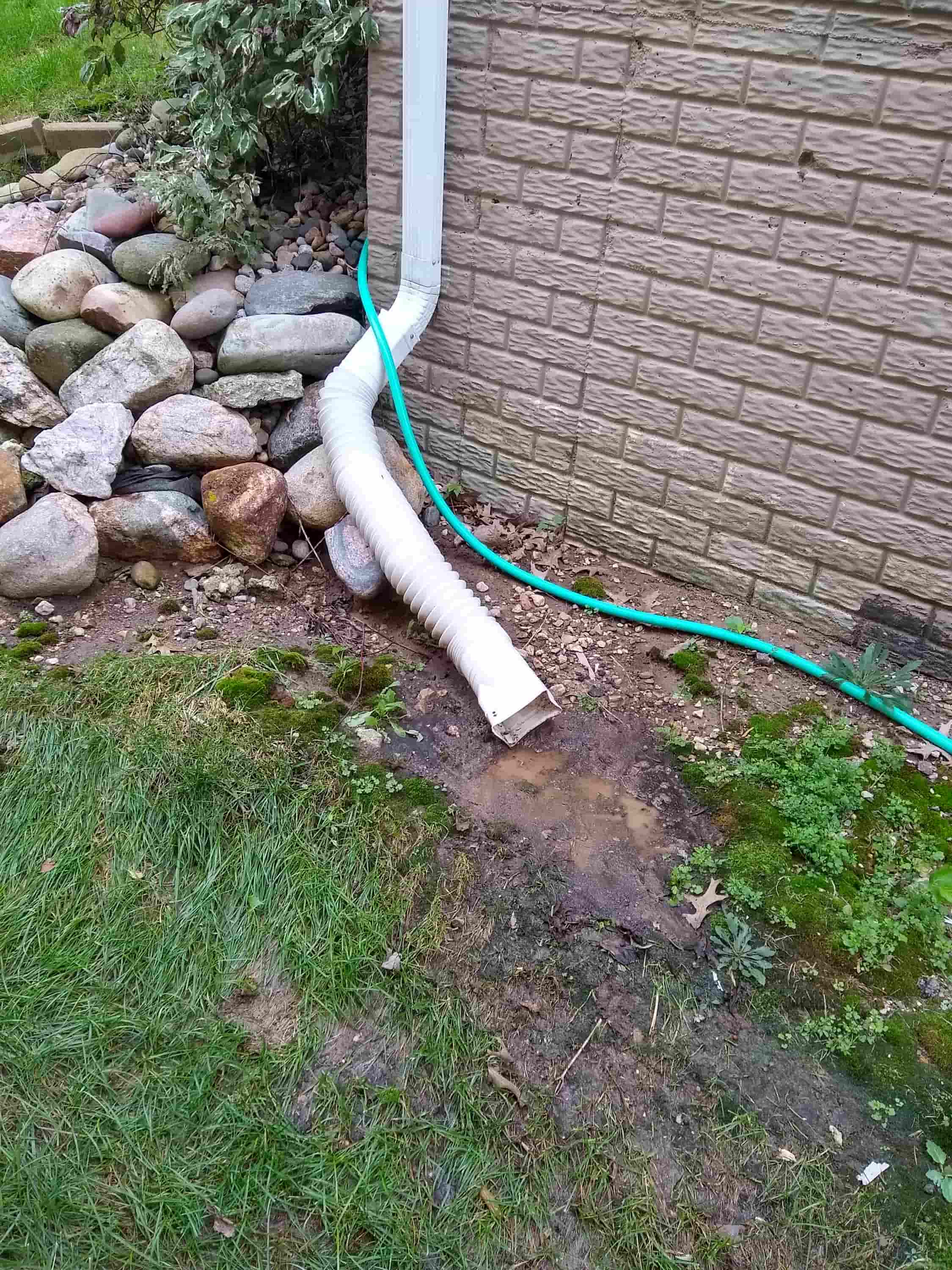 how to clean gutters and downspouts