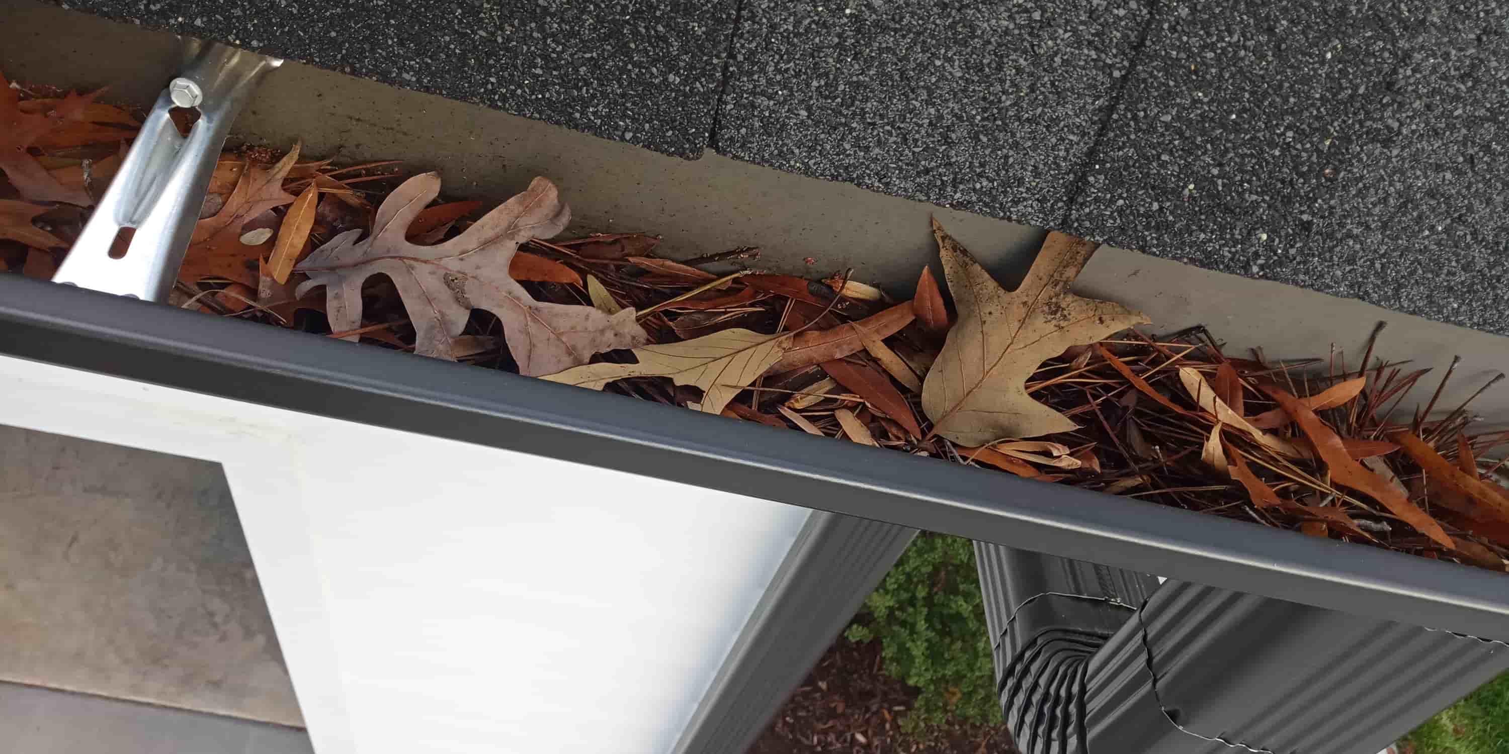 how to clean rain drain pipes