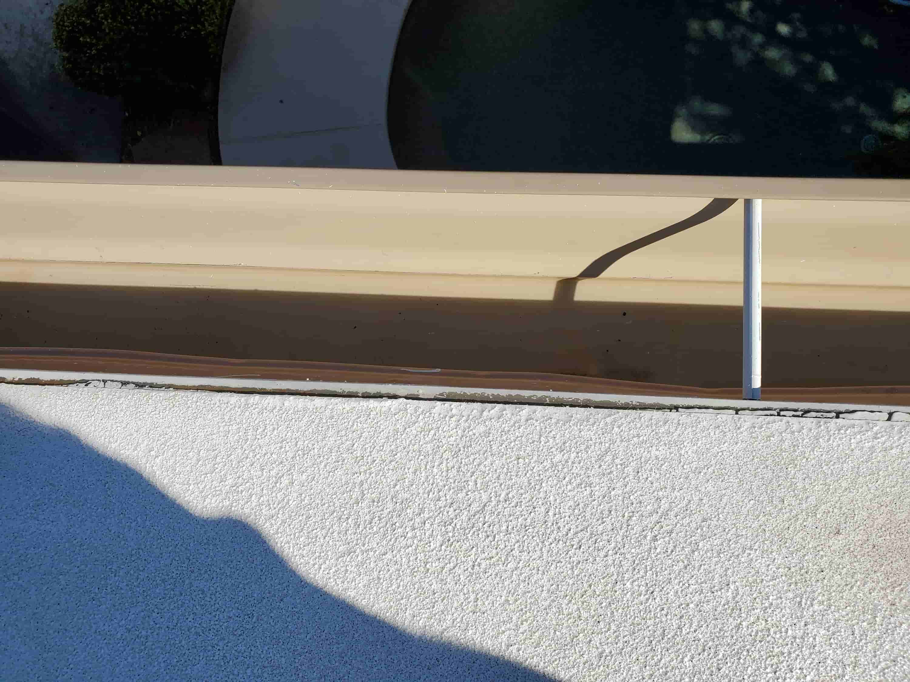 unclog gutter downspout