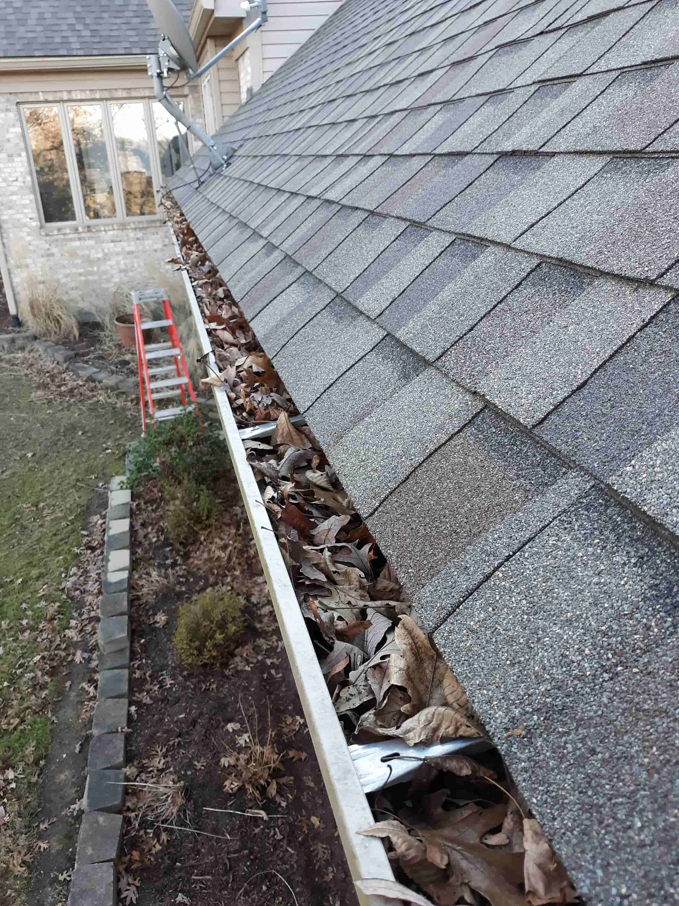 gutter cleaning and roof repair